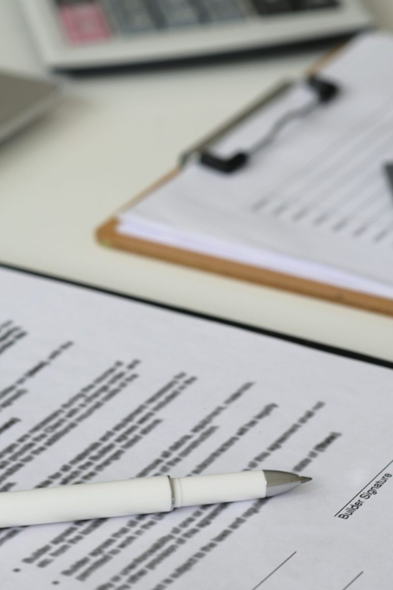 pen-with-documents-to-sign-house-construction-cont-2023-11-27-05-06-57-utc